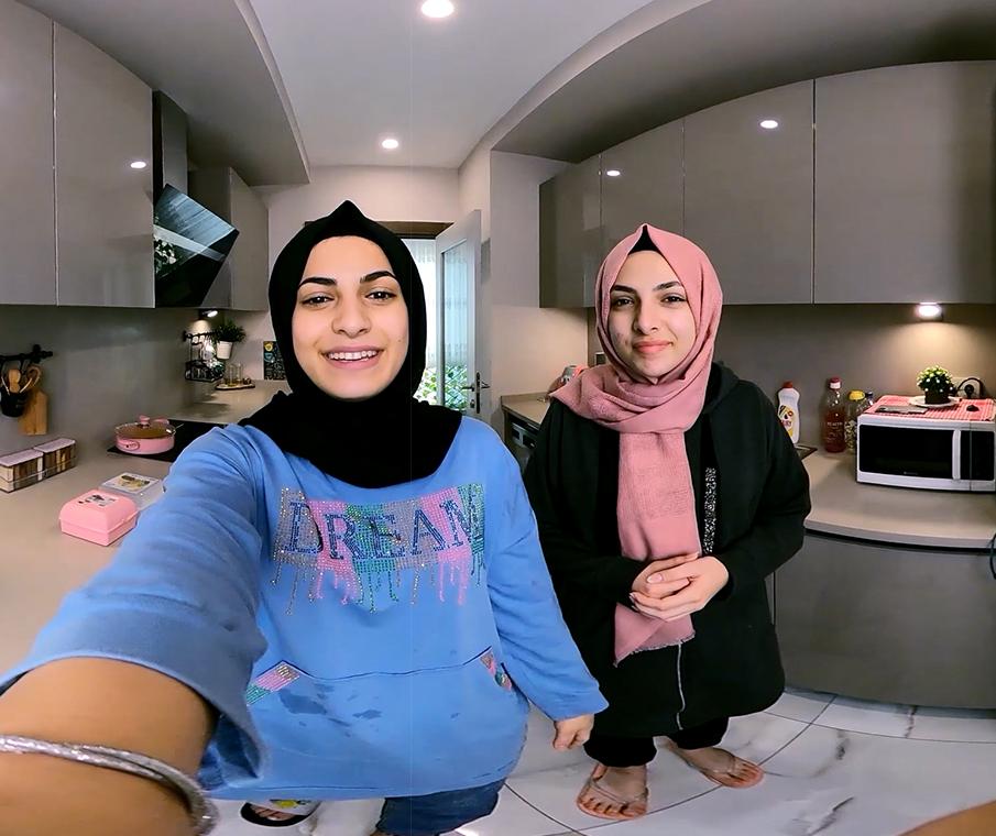 Haya & Maram preparing their lunch box